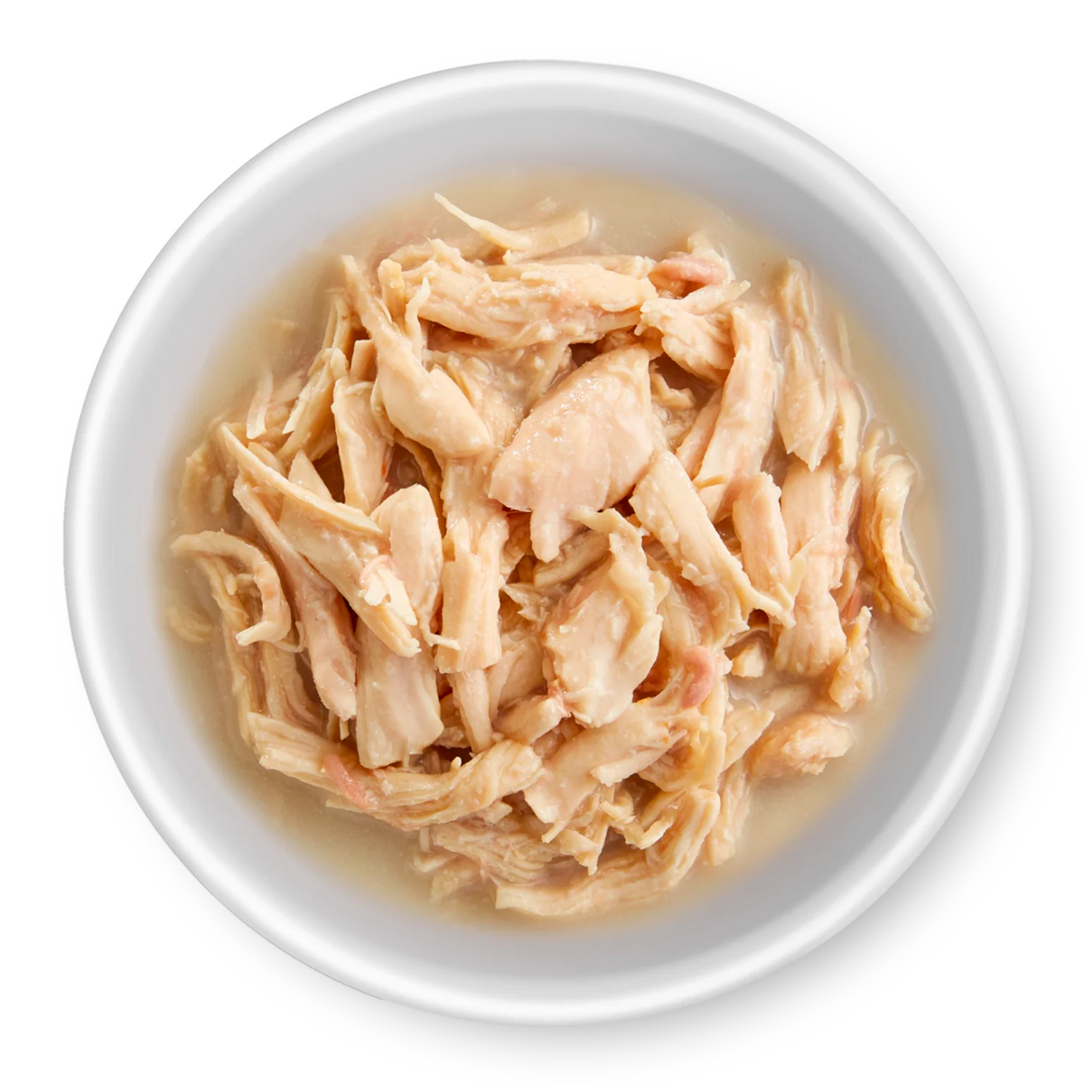 RAWZ Shredded Chicken Breast, Coconut Oil & New Zealand Green Mussels Dog Food – food served in a bowl